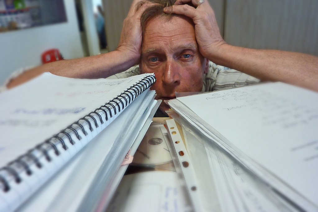Drowning under a mountain of paper by net_efekt nervous photo